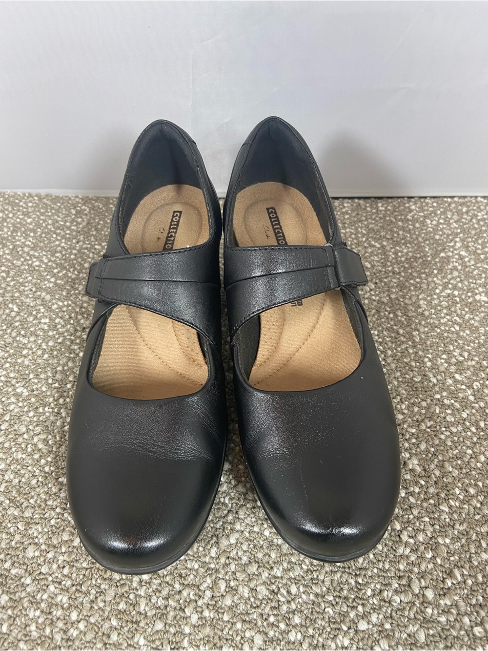 Clarks Emslie Lulin Black Mary Jane Flats with Strap an Ortholite footbed.
